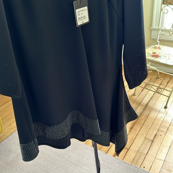 Long too.   Shiny black. Based at bottom.  Fall to the side. - Picture 3 of 5